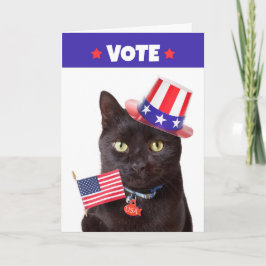 Tarjeta Festiva Vota gato patriótico con bandera y humor Gorra