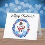 Tarjeta Festiva Watercolor Retro Snowman Wreath Merry Christmas<br><div class="desc">Una divertida y caprichosa tarjeta de invierno de Feliz Navidad con un muñeco de nieve retro enmarcado en un interior de bayas rojas, estrellas doradas y hojas azules decoradas con corona de flores. Cambie fácilmente el texto de guión elegante en el frente, en el interior y en la parte posterior...</div>