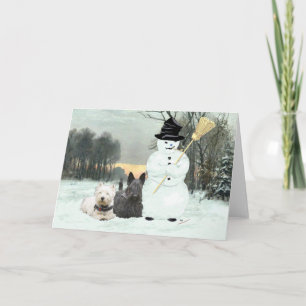 Tarjeta Festiva Westie y Scottie construyen un muñeco de nieve