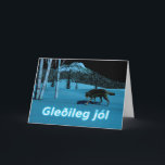 Tarjeta Festiva Winter Wolf - Gleðileg Jól<br><div class="desc">Un lobo camina sobre una nieve dura en la noche; un pico cubierto de árboles en el fondo. La luz de la luna refleja la nieve y la ladera pálida de los abedules. Los ojos del lobo también brillan con la luz de la luna reflejada. El texto islandés que dice...</div>