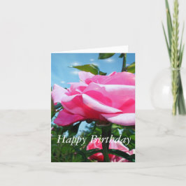 Tarjeta Flor rosa rosa rosa y hojas verdes en azul