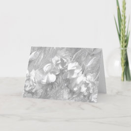 Tarjeta floral de tela blanca sobre blanco, en bla