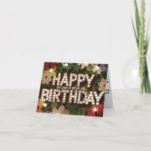 Tarjeta Flores con texto de feliz cumpleaños iluminado por