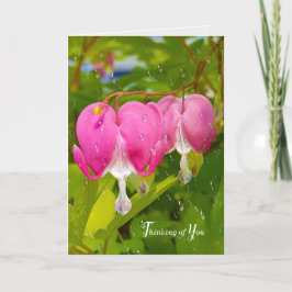 Tarjeta flores de corazón rosadas sangrantes