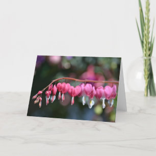 Tarjeta Flores de corazón sangrantes