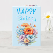 Flores de gerbera feliz cumpleaños en blanco azul