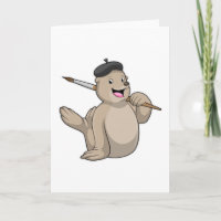 Foca como pintor con pincel