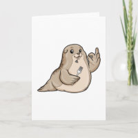 Foca con pescado y tenedor