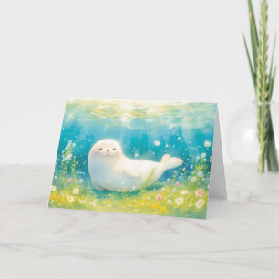 Tarjeta Foca dichosa bajo rayos del océano