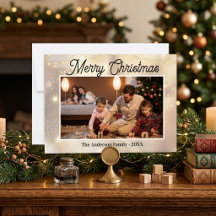 Foto de Navidad elegante de familia con copo de ni