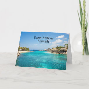Tarjeta Foto de playa tropical escénica con cabañas de paj
