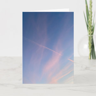 Tarjeta Fotografía de estelas en el cielo de una puesta de