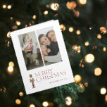 Tarjeta Fotos de la familia Merry Christmas 2<br><div class="desc">Celebra la temporada navideña con la tarjeta de tipografía fotográfica Merry Christmas 2 de Modern Nutcracker! Esta impresionante tarjeta cuenta con un hermoso cazador de nueces acuático con un telón de fondo de tipografía festiva en un rico tono burdeos. Personalice sus 2 fotos familiares y el nombre de su familia...</div>