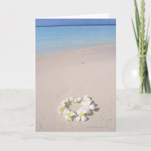 Tarjeta Frangipani en la playa
