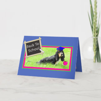Tarjeta Funny Basset de vuelta a la carta escolar con Appl