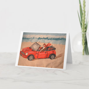 Tarjeta Galgo en auto convertible rojo en la playa