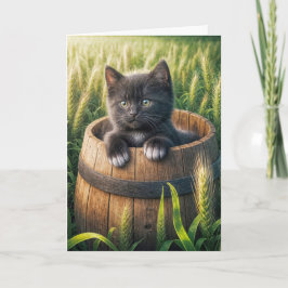 Tarjeta Gatito lindo en un barril de madera