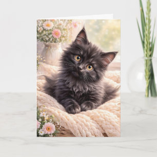 Tarjeta Gatito negro acogedor en manta de punto con flores