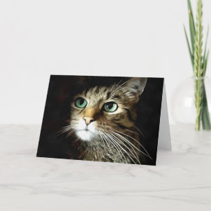 Tarjeta Gato atigrado con ojos verdes aislado sobre negro