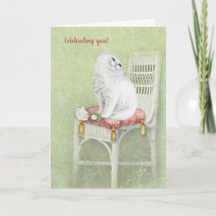 Tarjeta gato blanco persa en el cumpleaños de la silla