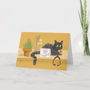 Tarjeta Gato en el día de las enfermeras en mesa con estet