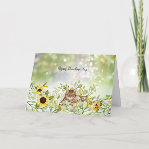Tarjeta Gato en un campo de acción de gracias de girasoles