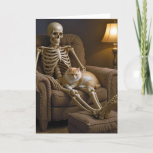 Tarjeta Gato en un esqueleto de Halloween