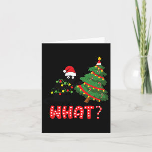 Tarjeta Gato negro gracioso que presiona el árbol de Navid