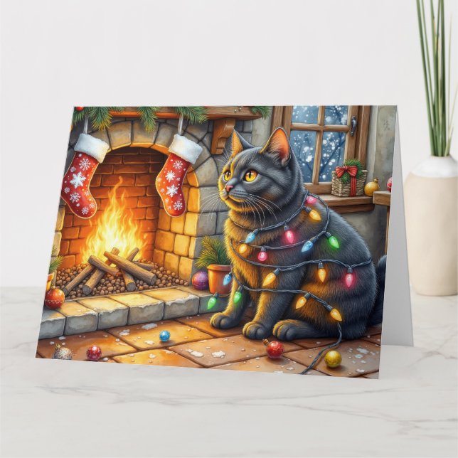 Tarjeta Gato Negro Sentado junto a Chimenea con Luces de N (Anverso)