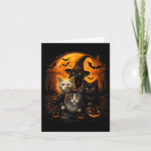 Tarjeta Gatos blancos y negros de Halloween con calabazas