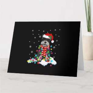 Tarjeta gif de luces de navidad de schnauzer lindo con som