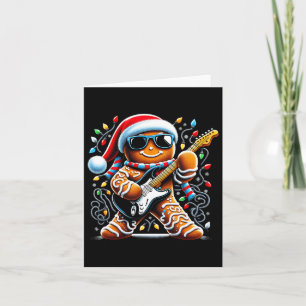 Tarjeta Gingerbread de guitarra de rock tocando la guitarr