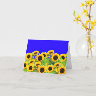 Tarjeta girasoles con bandera de Ucrania colorean paz por