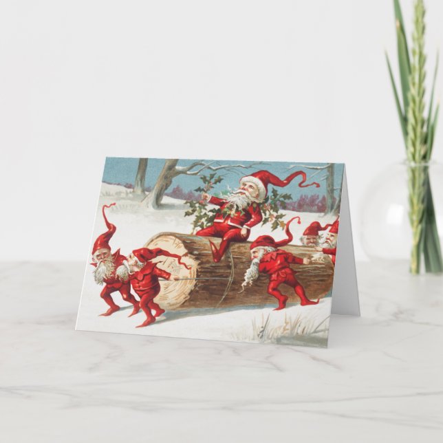 Tarjeta Gnomes dragging a cut tree trunk through the snow (Anverso)