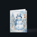 Tarjeta Gorra azul dulce de Snowman árboles de escarf casa<br><div class="desc">Adorables muñecos de nieve con gorra azul y bufanda rodeados de flores blancas bonitos,  árboles cubiertos de nieve y un pajar en este frío día de invierno.</div>