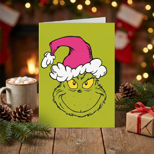 Tarjeta Grinch con sombrero rosa de Santa