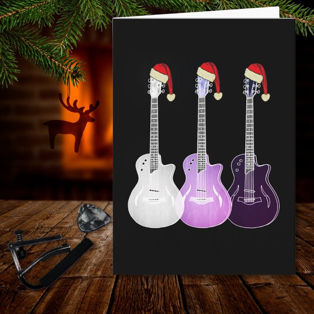 Tarjeta Guitarra eléctrica de Navidad rosa (Christmas guitars wearing santa hats pink black and white music themed holiday greetings card)