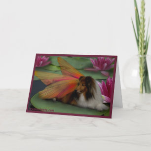 Tarjeta Hada de Sheltie en un cojín de lirio. psd de la