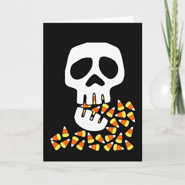 Tarjeta Halloween, calavera comiendo maíz dulce, truco o t (Anverso)