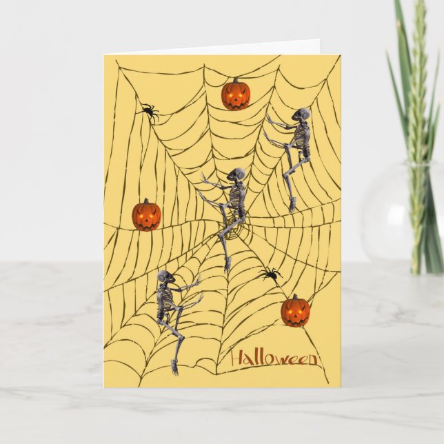 Tarjeta Halloween con esqueletos, calabazas, arañas y web (Anverso)