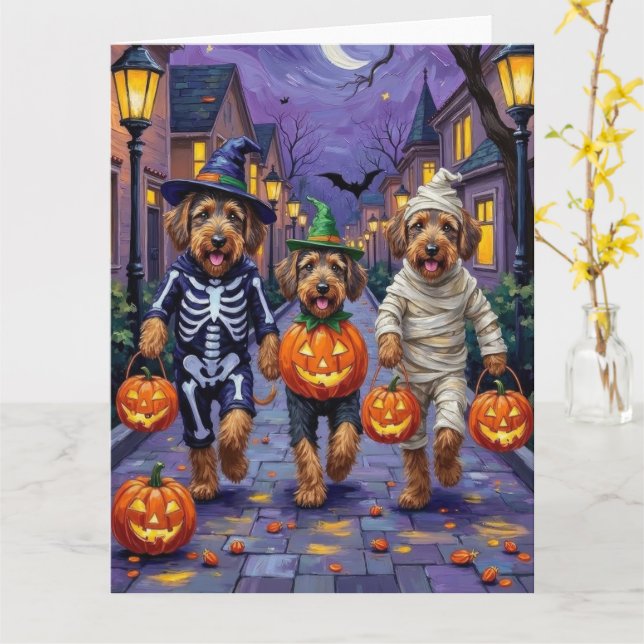 Tarjeta Halloween Trick-or-Treating Dogs de Airedale Terri (flor amarilla)
