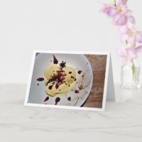 Helado de vainilla con salsa de mora