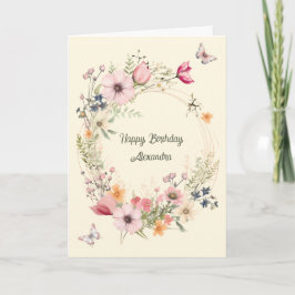 Tarjeta Hermosa guirnalda floral y mariposas cumpleaños