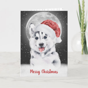 Tarjeta Husky con copos de nieve y luz de la luna