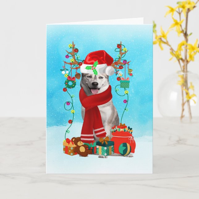 Tarjeta husky siberiano en la nieve con regalos de Navidad (flor amarilla)