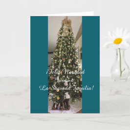 Tarjeta Junto a la Sagrada Familia en Navidad.
