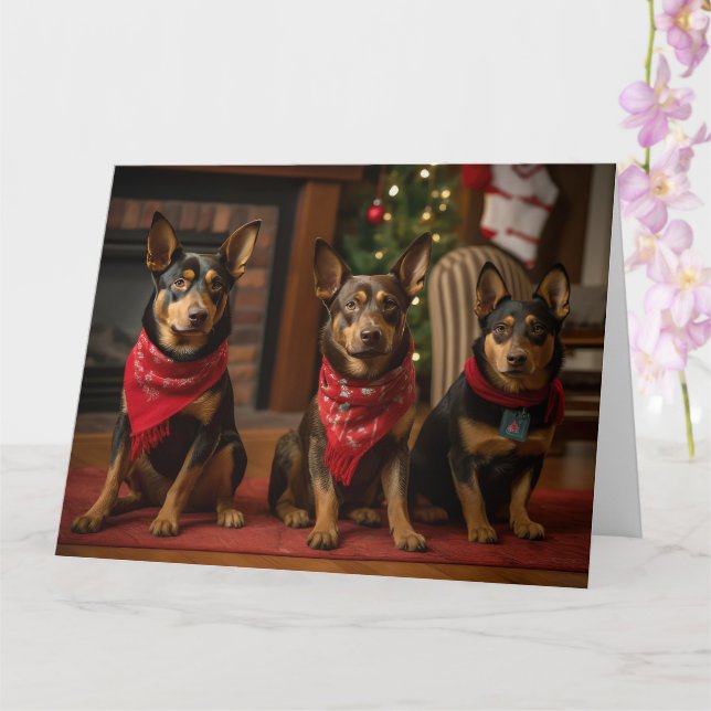 Tarjeta Kelpie australiano junto a la chimenea de Navidad (Orquídea)