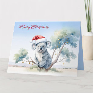 Tarjeta Koala sentado en un árbol de goma Feliz Navidad