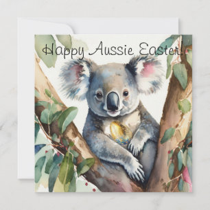 Tarjeta Koala sosteniendo un huevo de Pascua de oro