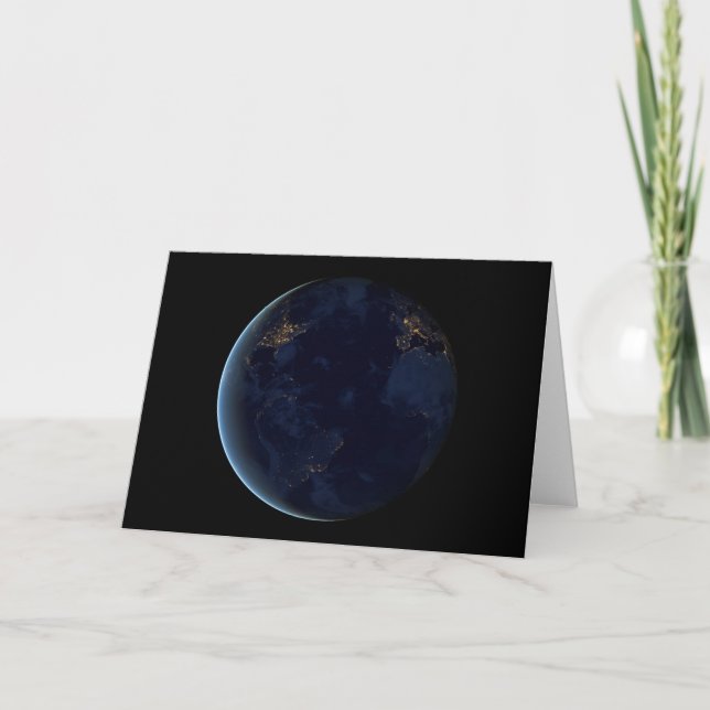 Tarjeta La ciudad de la Tierra se ilumina de noche (Anverso)